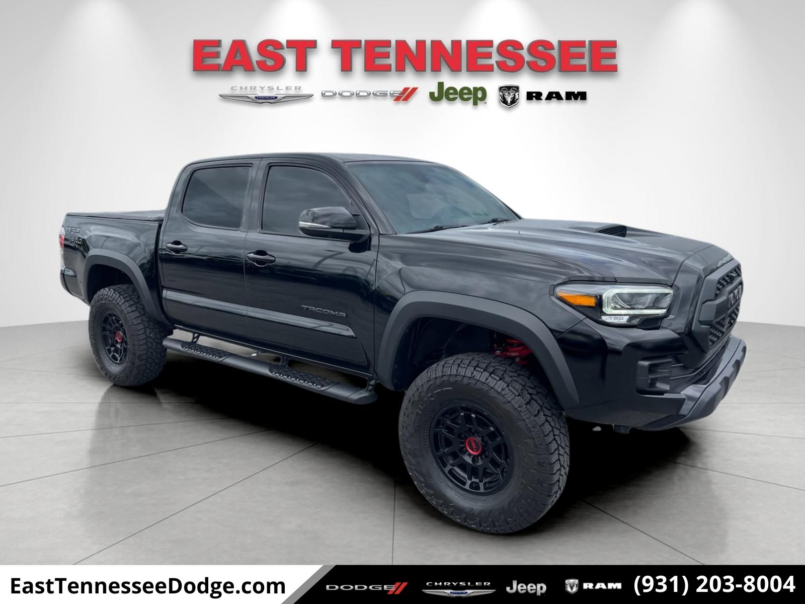 Black 2023 Toyota Tacoma Pickup Truck Four-Wheel Drive Manual