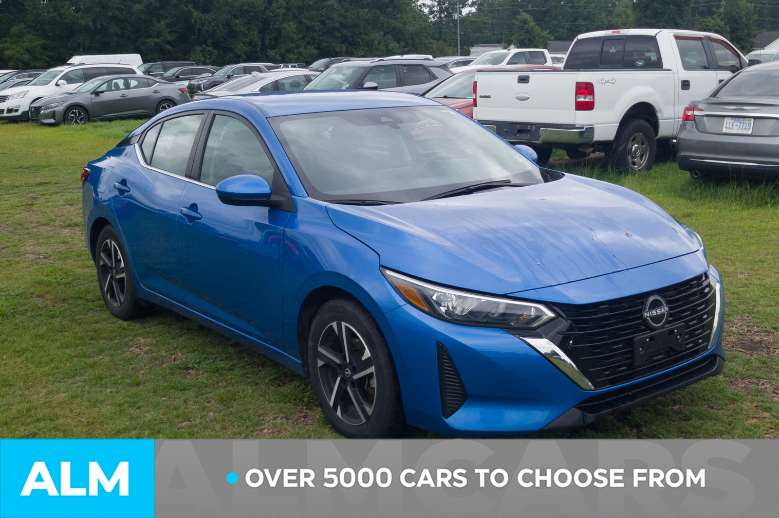 Used 2024 Electric Blue Metallic Nissan SV image 3