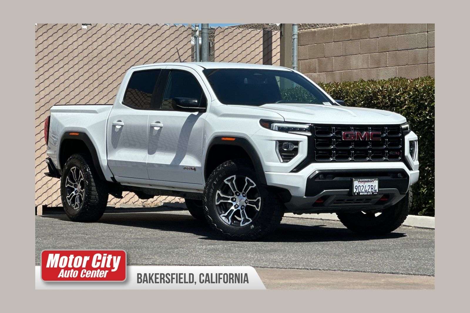 Summit White 2024 GMC Canyon AT4 Crew Cab 4WD Pickup Truck Four-Wheel Drive 8-Speed Automatic