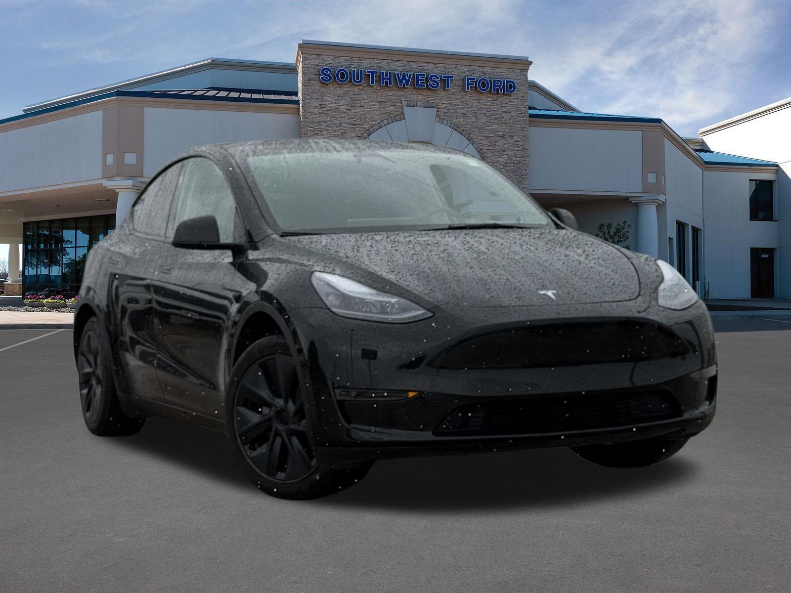 Solid Black 2025 Tesla Model Y SUV / Crossover Rear-Wheel Drive 1-Speed Automatic