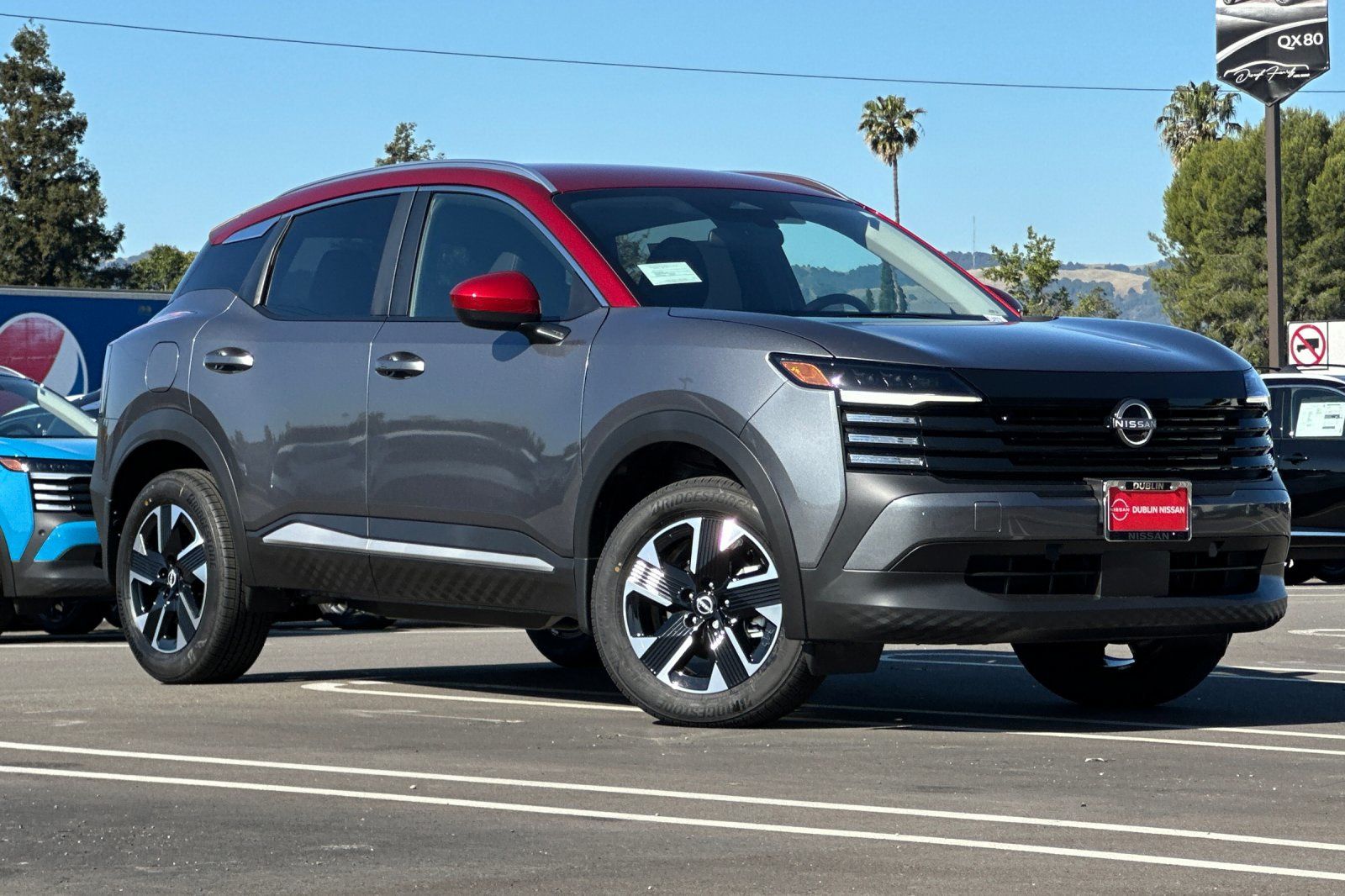 Red (Gun Metallic/Scarlet Ember Tintcoat) 2026 Nissan Kicks SUV / Crossover All-Wheel Drive Continuously Variable Transmission