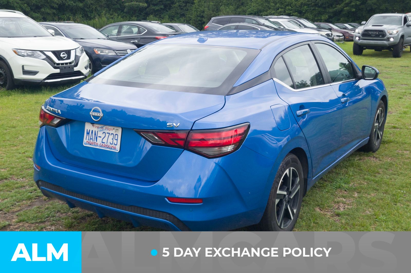 Used 2024 Electric Blue Metallic Nissan SV image 4