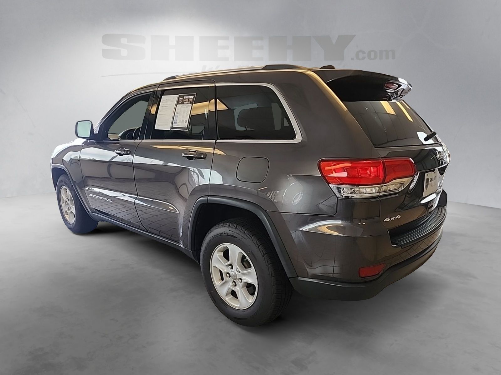 Used 2014 Granite Crystal Clearcoat Metallic Jeep Laredo image 14