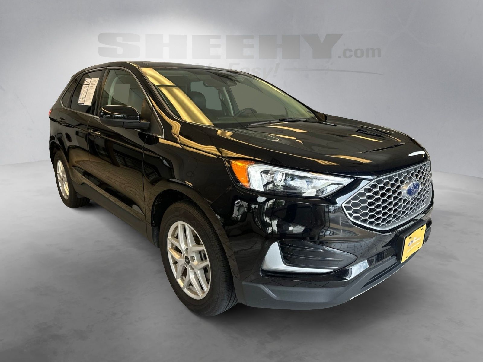 Certified Used 2024 Agate Black Metallic Ford SEL image 2
