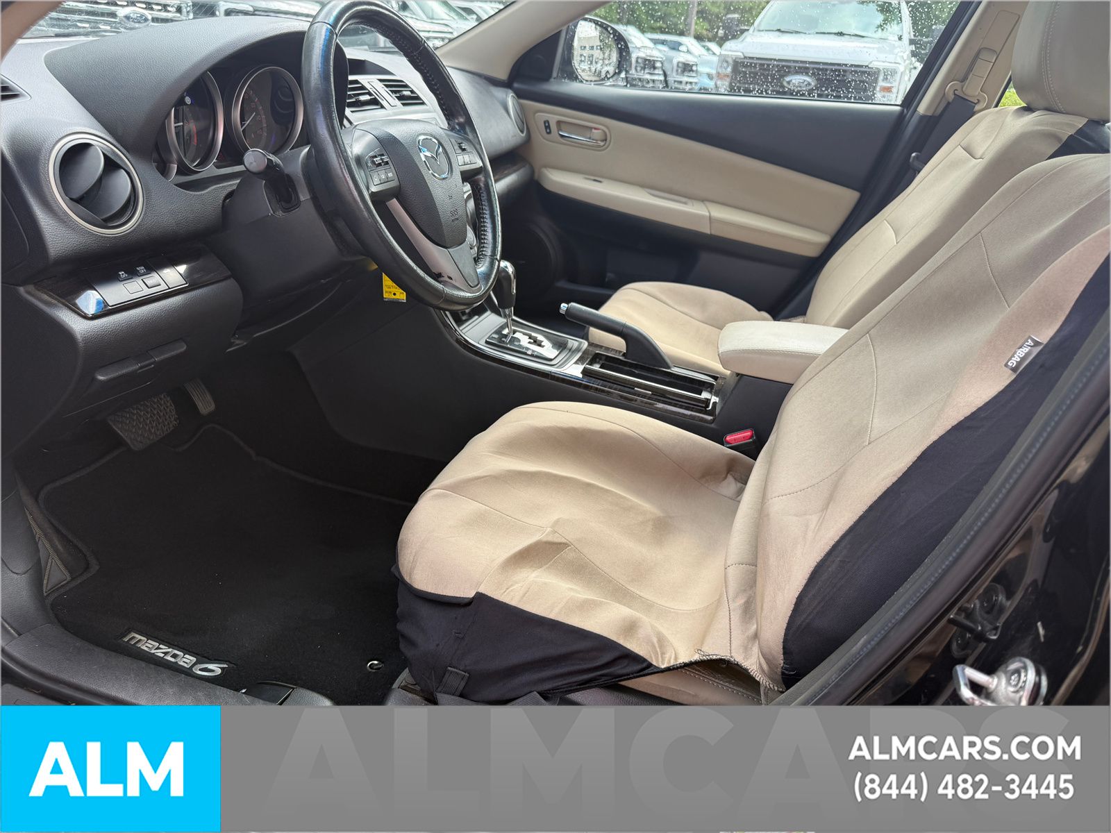 Used 2013 Black Mazda i Grand Touring image 10