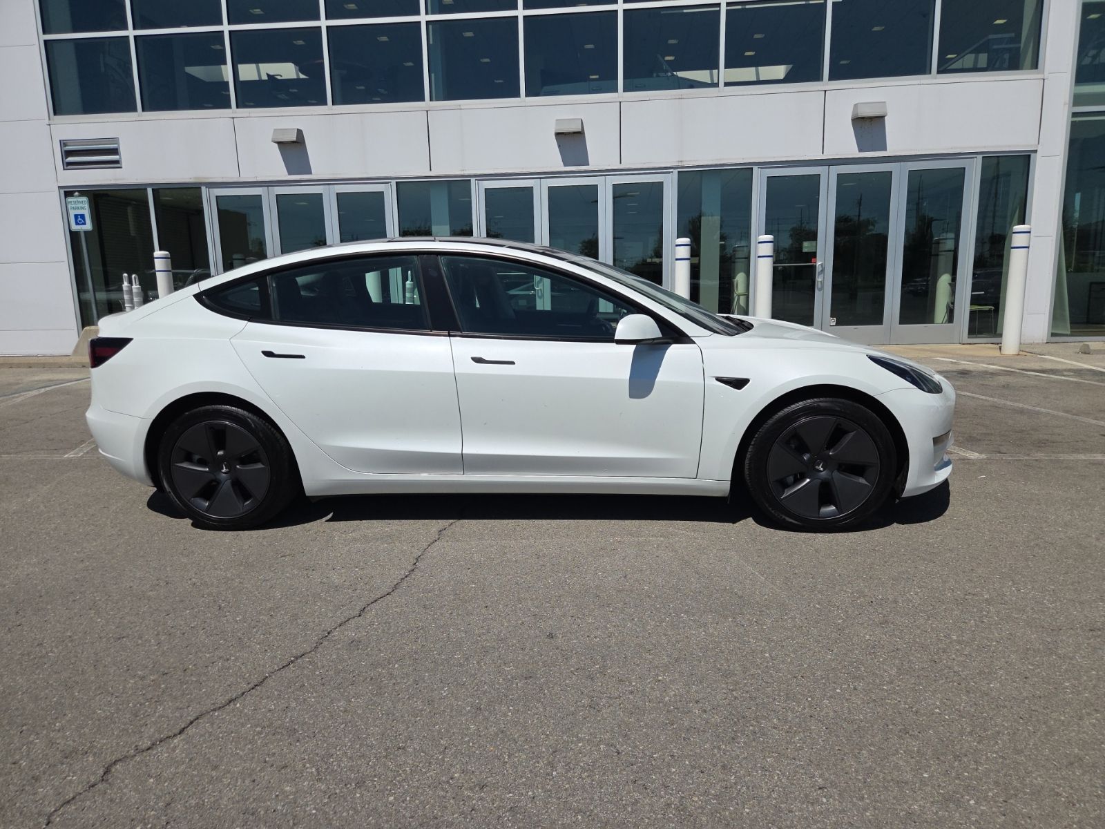 used 2023 Tesla Model 3 car, priced at $30,750