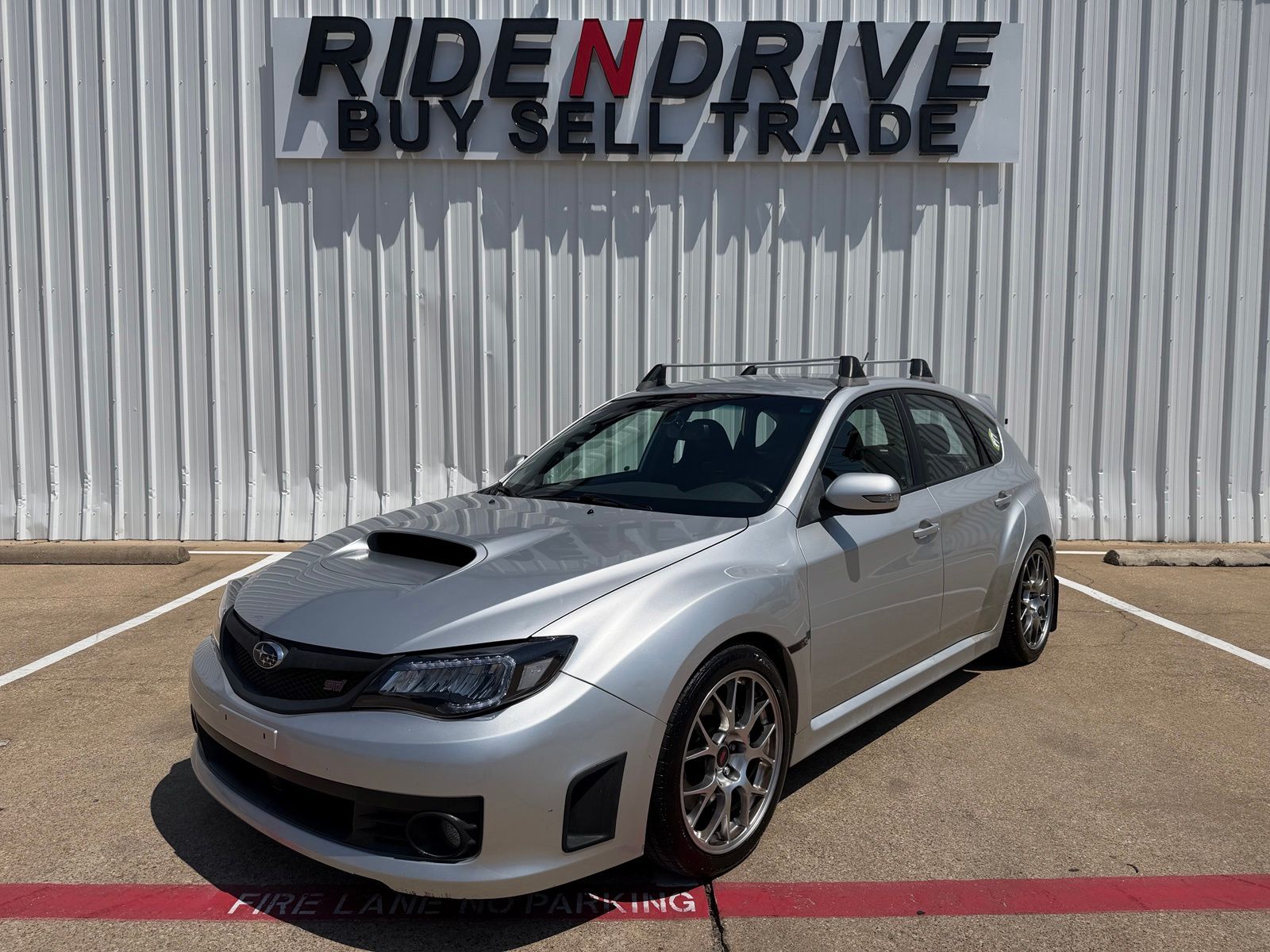 Spark Silver Metallic 2010 Subaru Impreza WRX STI Hatchback All-Wheel Drive 6-Speed Manual
