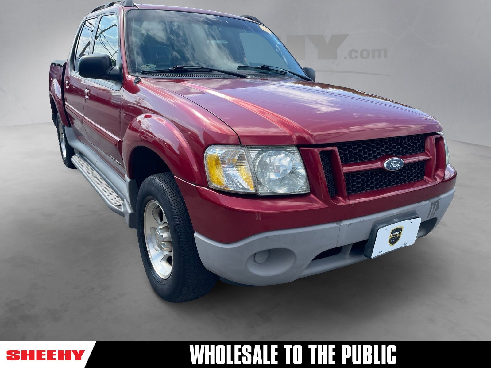 Toreador Red Clearcoat Metallic 2002 Ford Explorer Sport Trac Pickup Truck Four-Wheel Drive 5-Speed Automatic