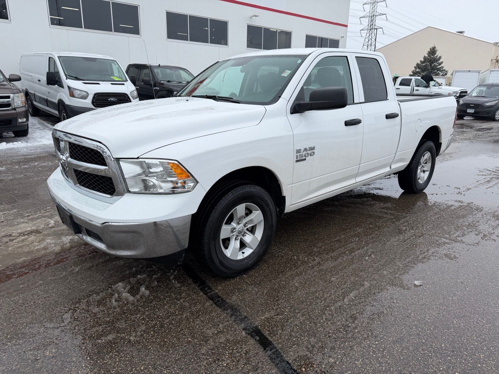 Bright White Clearcoat 2024 RAM 1500 Classic SLT Quad Cab 4WD Pickup Truck Four-Wheel Drive 8-Speed Automatic