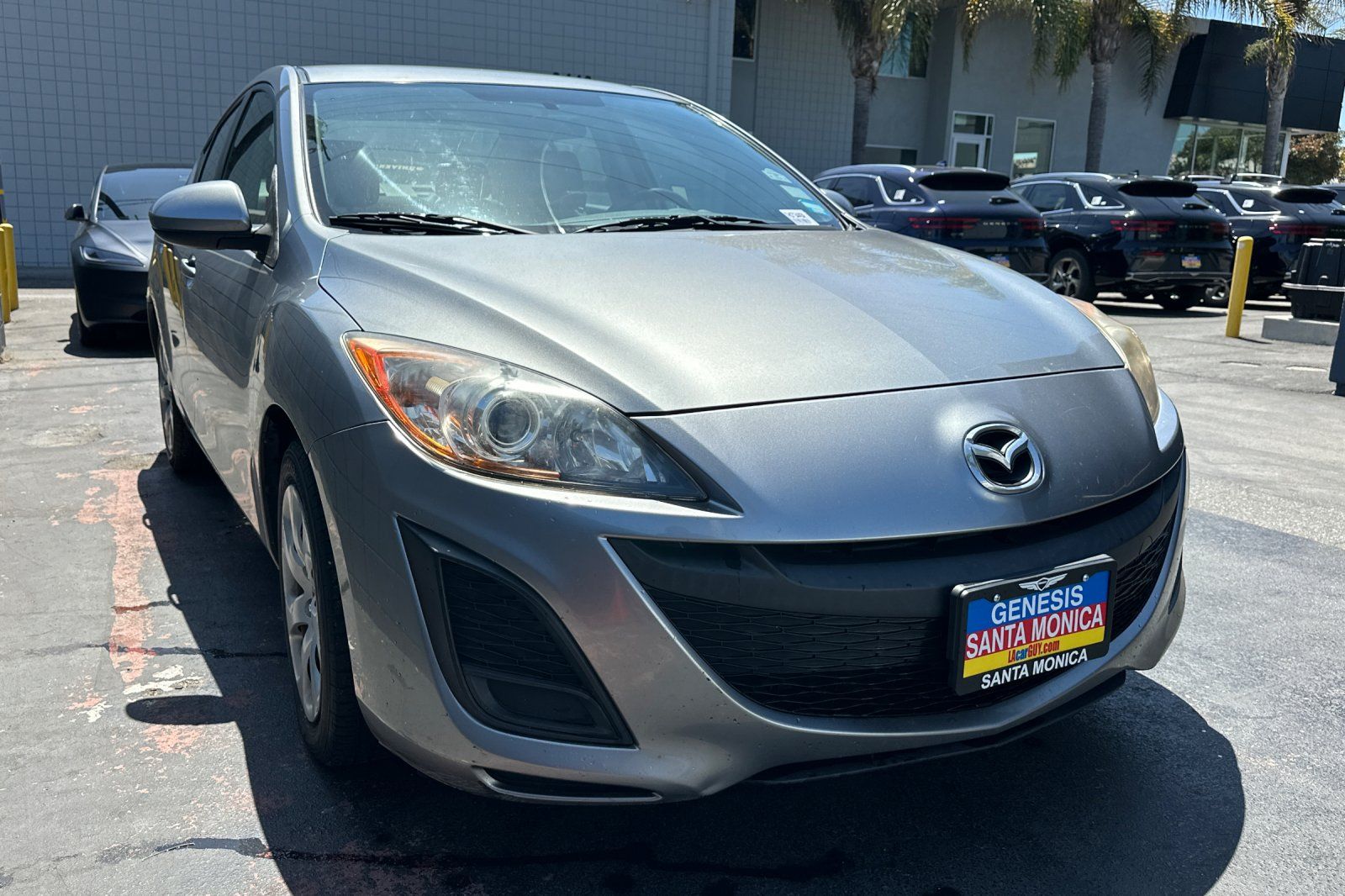 Liquid Silver Metallic 2010 Mazda MAZDA3 Sedan Front-Wheel Drive 5-Speed Automatic