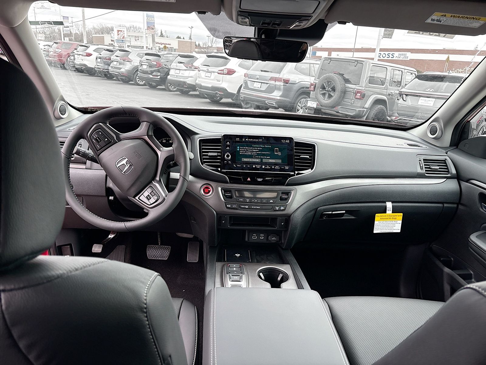 View vehicle photo 3