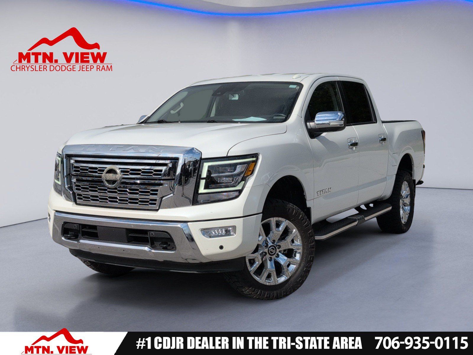 Pearl White 2021 Nissan Titan Pickup Truck Four-Wheel Drive 9-Speed Automatic