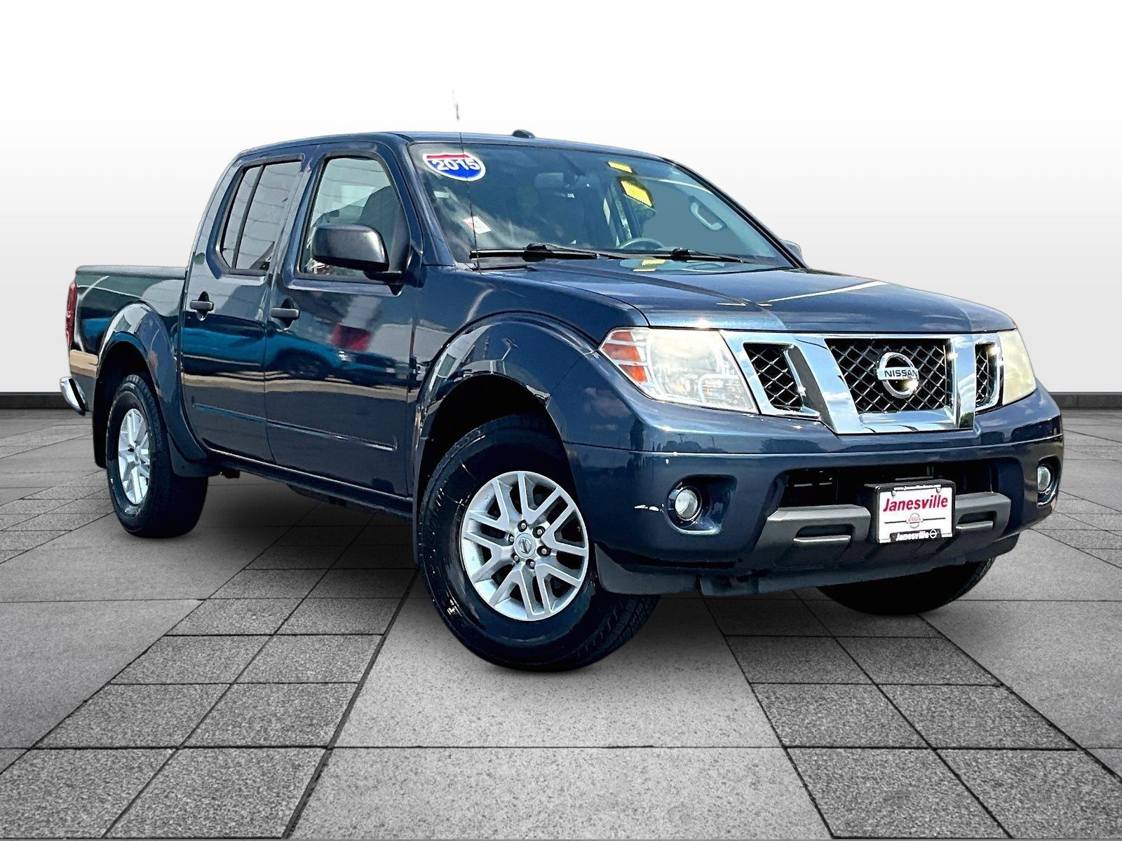 Arctic Blue Metallic 2015 Nissan Frontier Pickup Truck Four-Wheel Drive 5-Speed Automatic Overdrive