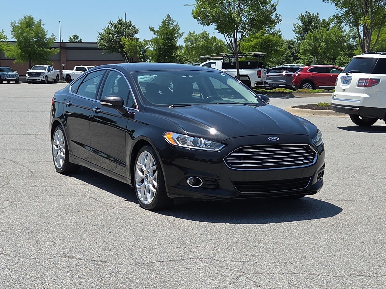 Tuxedo Black Metallic 2014 Ford Fusion Titanium Sedan Front-Wheel Drive 6-Speed Automatic