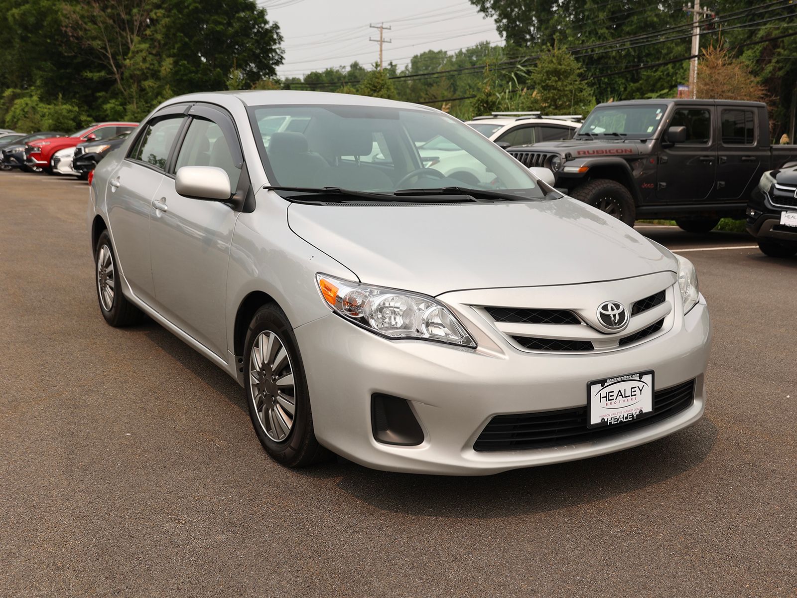 Classic Silver Metallic 2011 Toyota Corolla Sedan Front-Wheel Drive 4-Speed Automatic