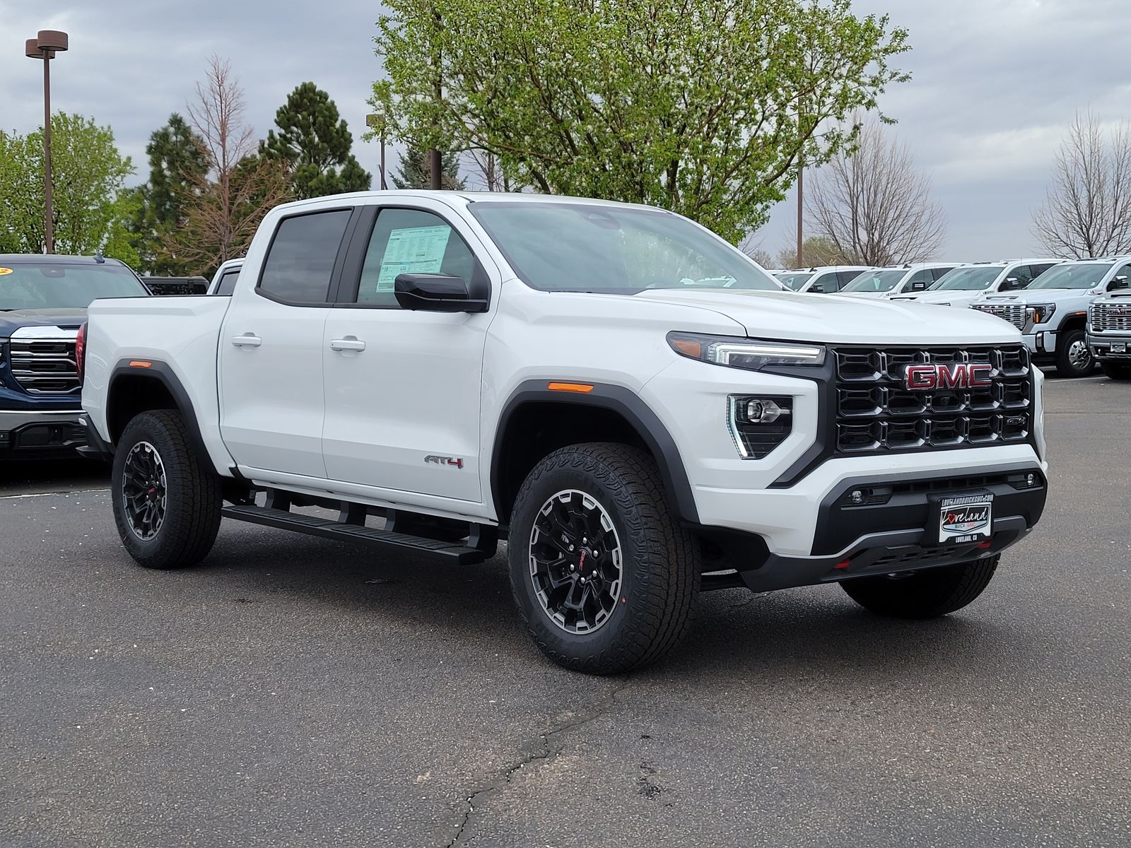 Summit White 2026 GMC Canyon AT4 Crew Cab 4WD Pickup Truck Four-Wheel Drive 8-Speed Automatic