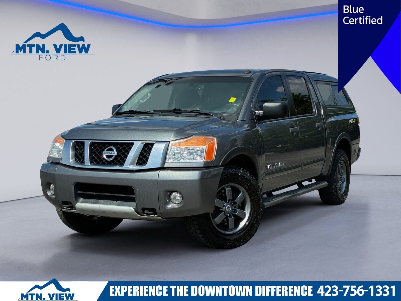 Gray (Gun Metallic) 2014 Nissan Titan Pickup Truck Four-Wheel Drive 5-Speed Automatic