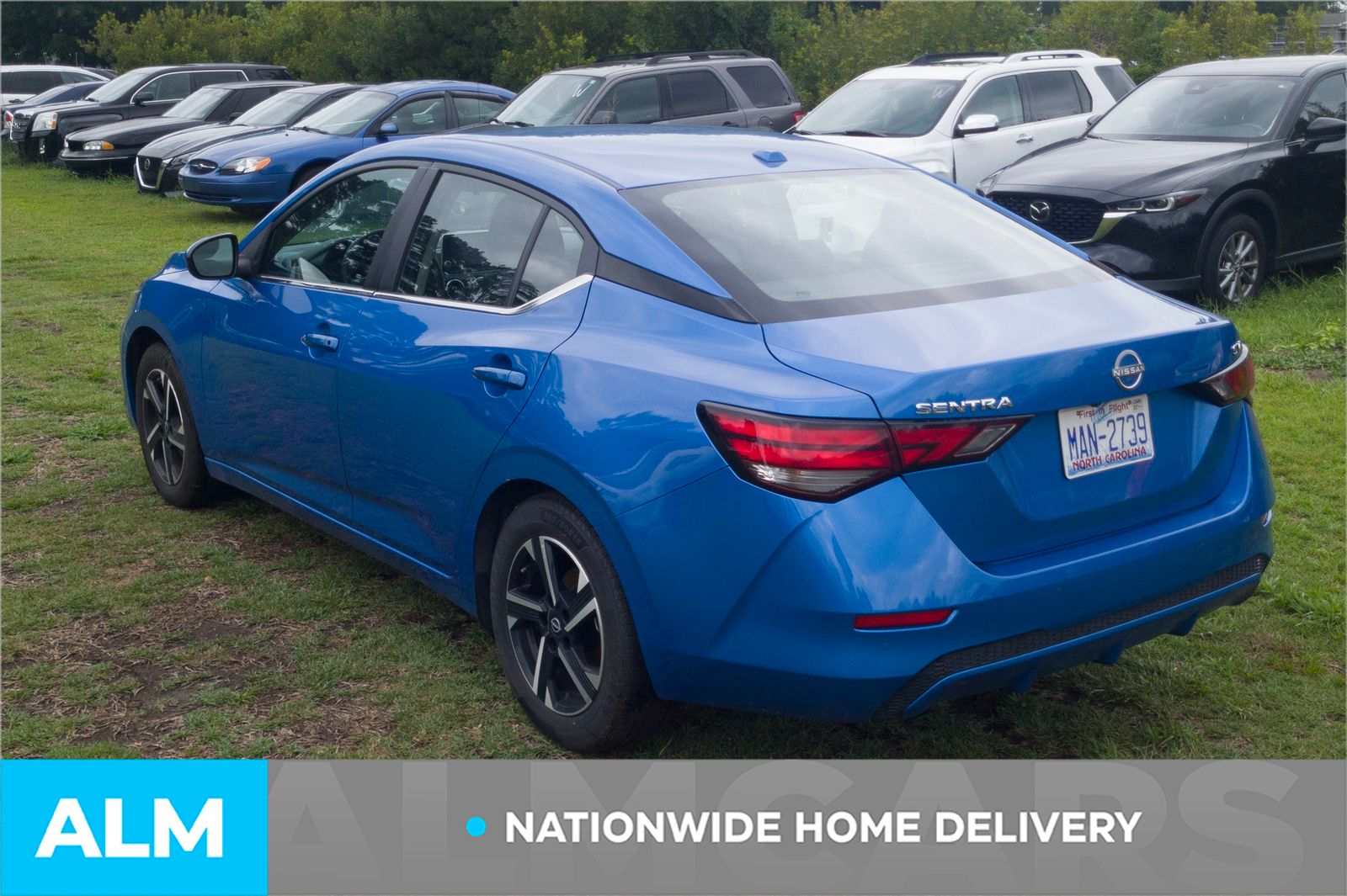 Used 2024 Electric Blue Metallic Nissan SV image 5