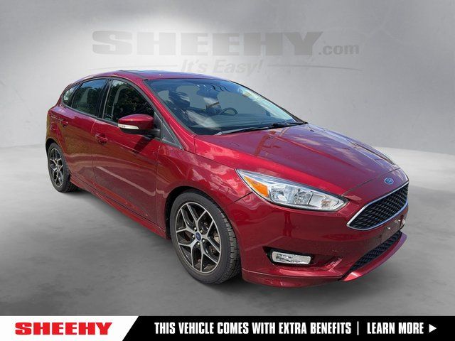 Ruby Red Metallic 2015 Ford Focus SE Hatchback Hatchback Front-Wheel Drive 6-Speed Automatic