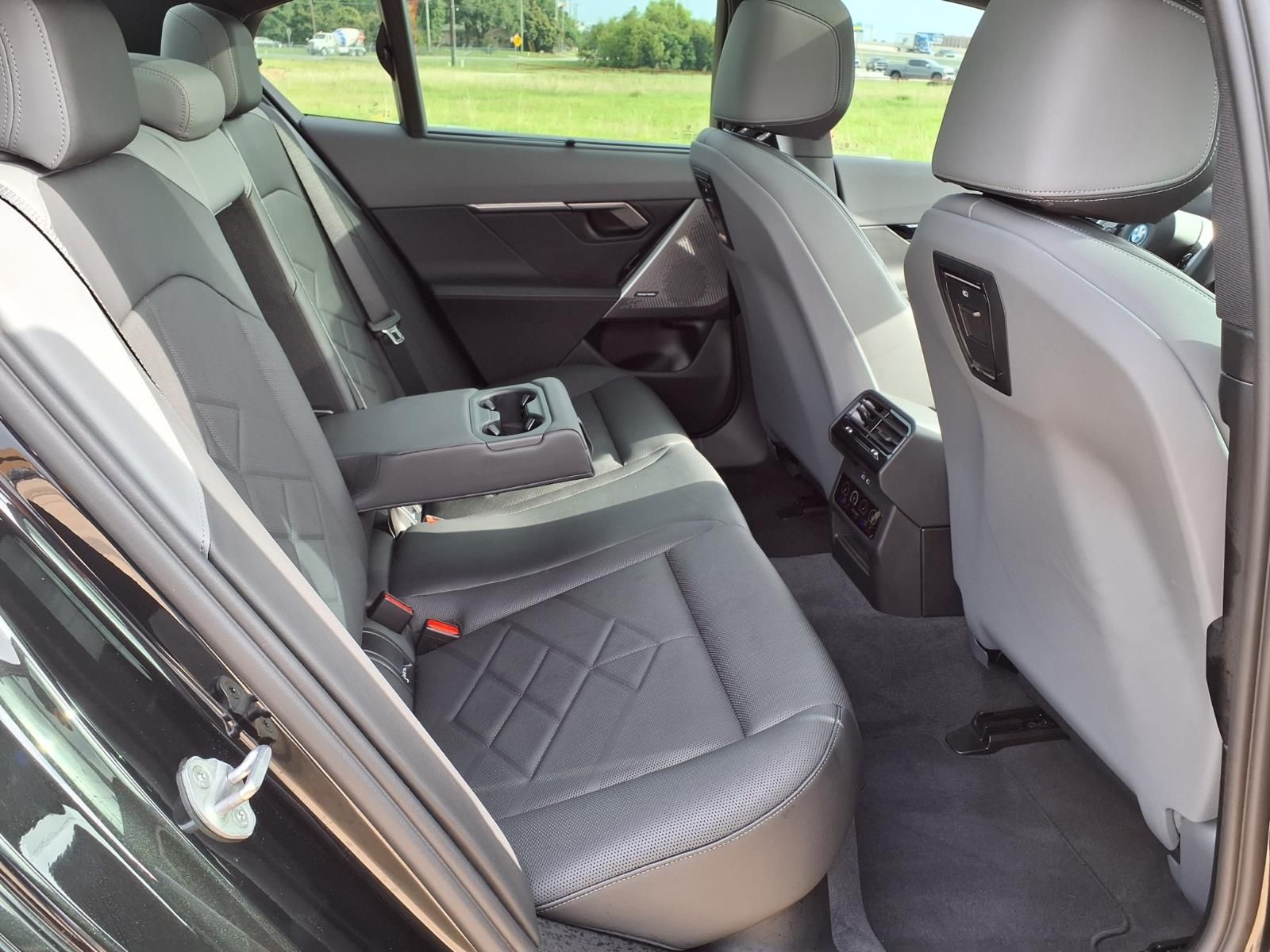 2026 BMW 5 Series 550e xDrive Black at Central Houston Nissan