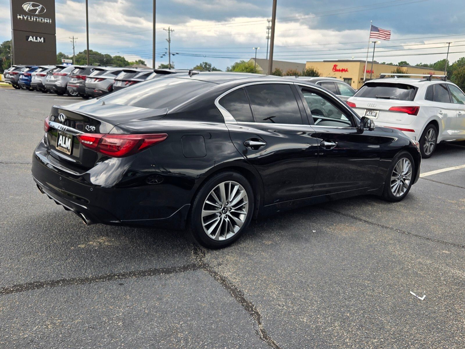 Used 2024 Black INFINITI LUXE image 13