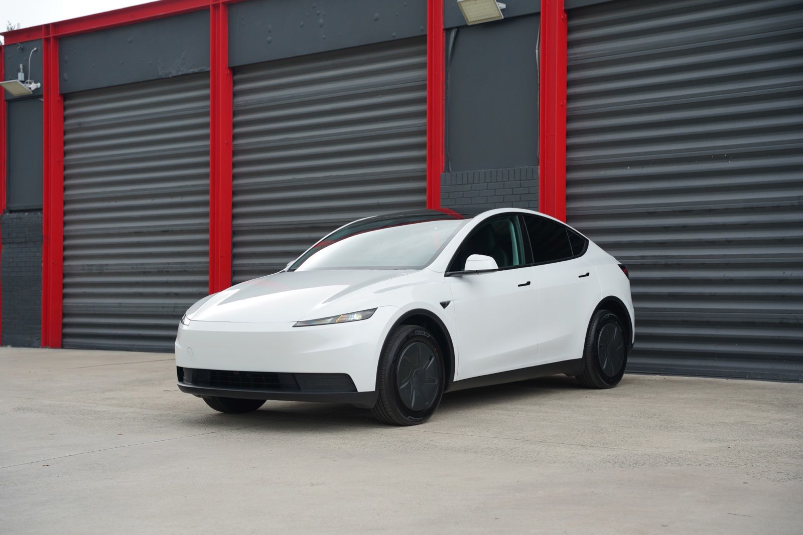 Pearl White Multi-Coat 2026 Tesla Model Y  Rear-Wheel Drive 1-Speed Automatic