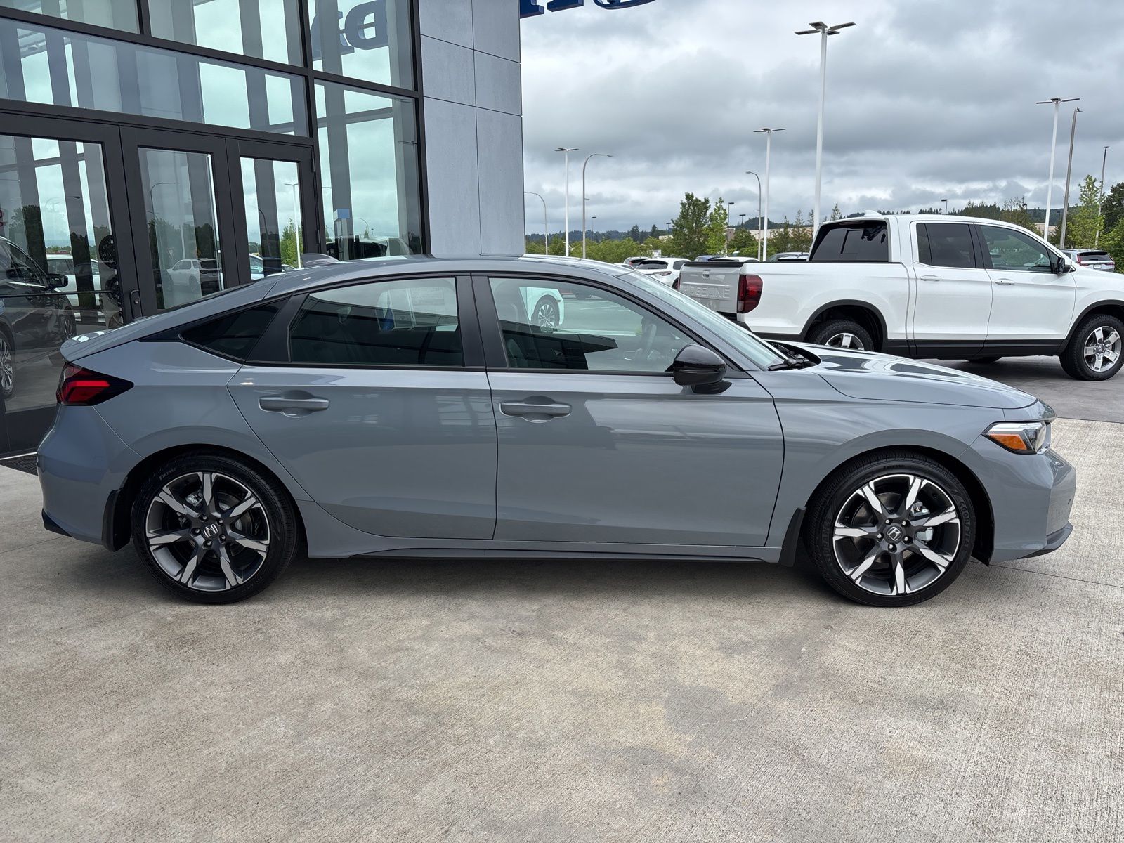 2026 Honda Civic Sport Touring Hybrid CVT's photo