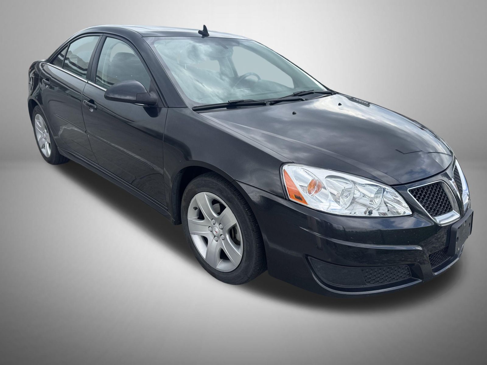 Carbon Black Metallic 2010 Pontiac G6 Sedan Sedan Front-Wheel Drive 4-Speed Automatic Overdrive
