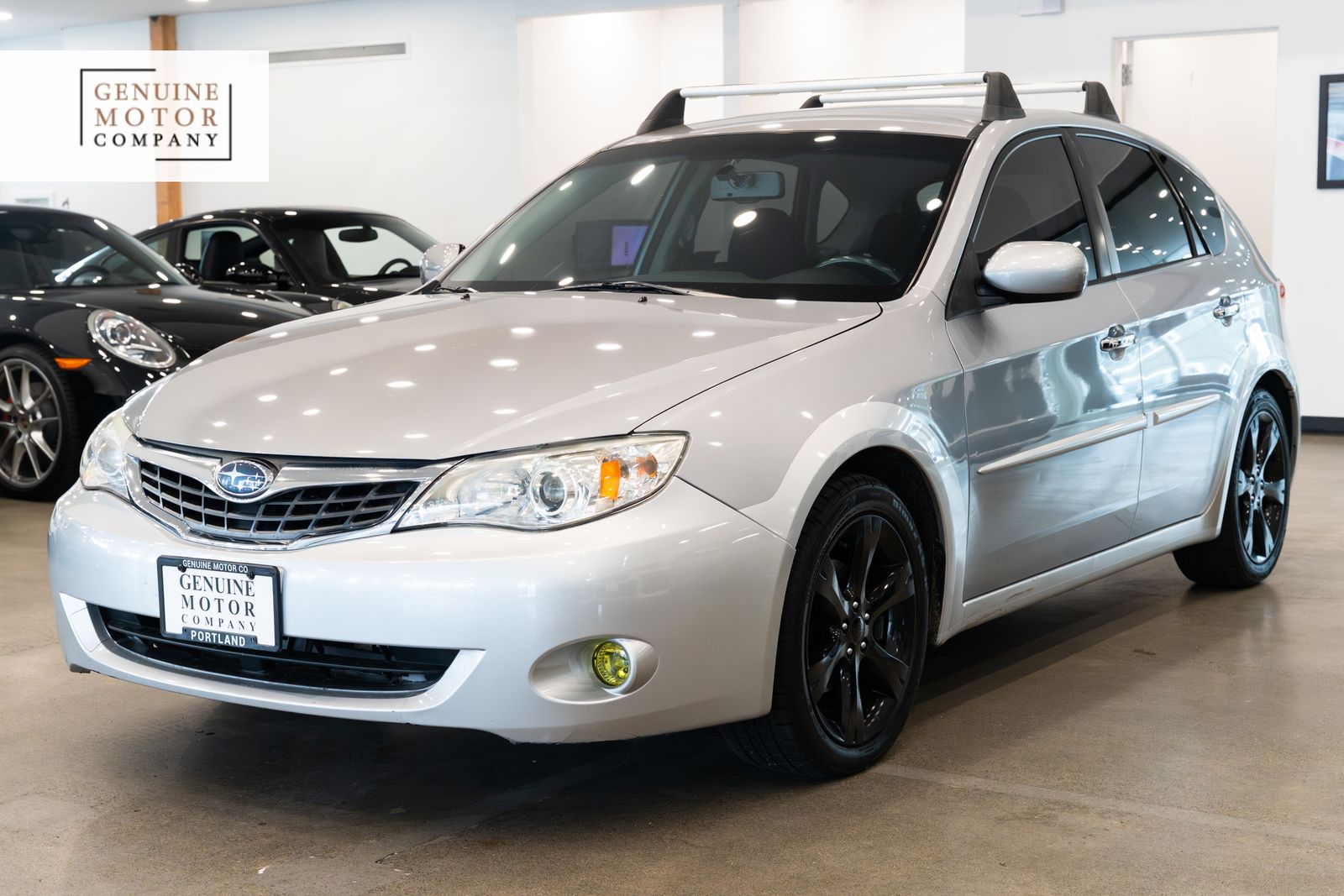 Gray (Steel Silver Metallic) 2009 Subaru Impreza Outback Sport Wagon All-Wheel Drive 4-Speed Automatic Overdrive