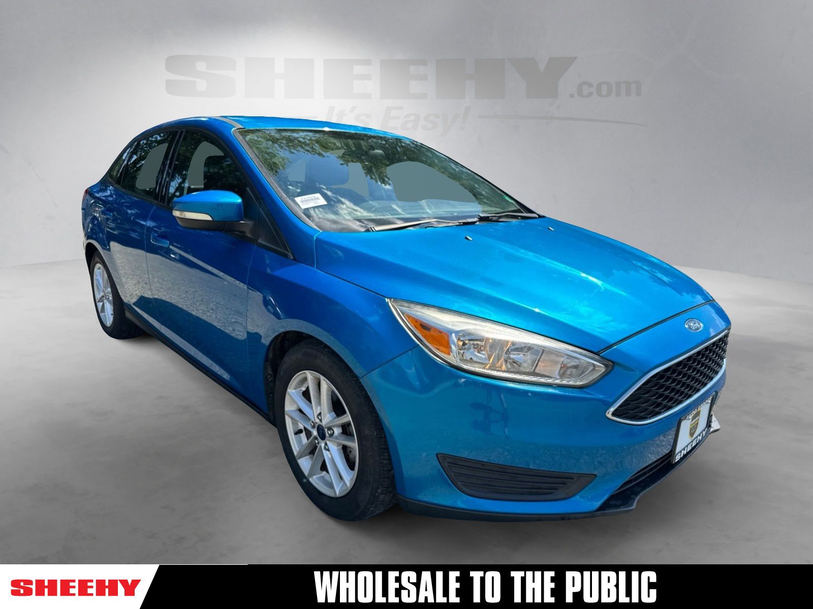 Blue Candy Metallic Tinted Clearcoat 2016 Ford Focus Sedan Front-Wheel Drive 6-Speed Automatic