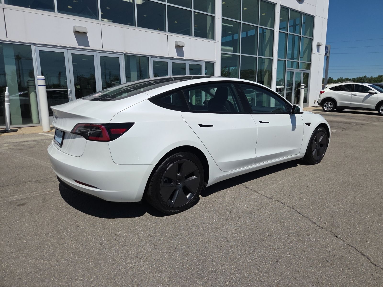 used 2023 Tesla Model 3 car, priced at $30,750