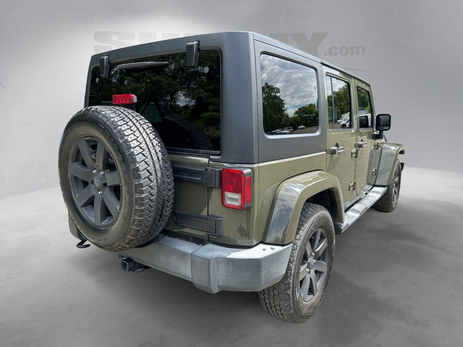 Used 2015 Tank Clearcoat Jeep Unlimited Sahara image 11