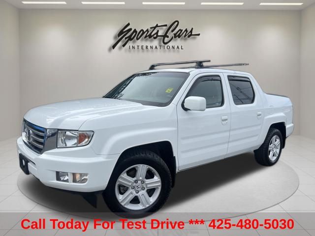 White 2012 Honda Ridgeline RTL Pickup Truck Four-Wheel Drive 5-Speed Automatic