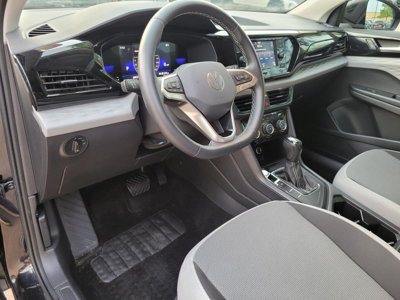 used 2023 Volkswagen Taos car, priced at $18,500
