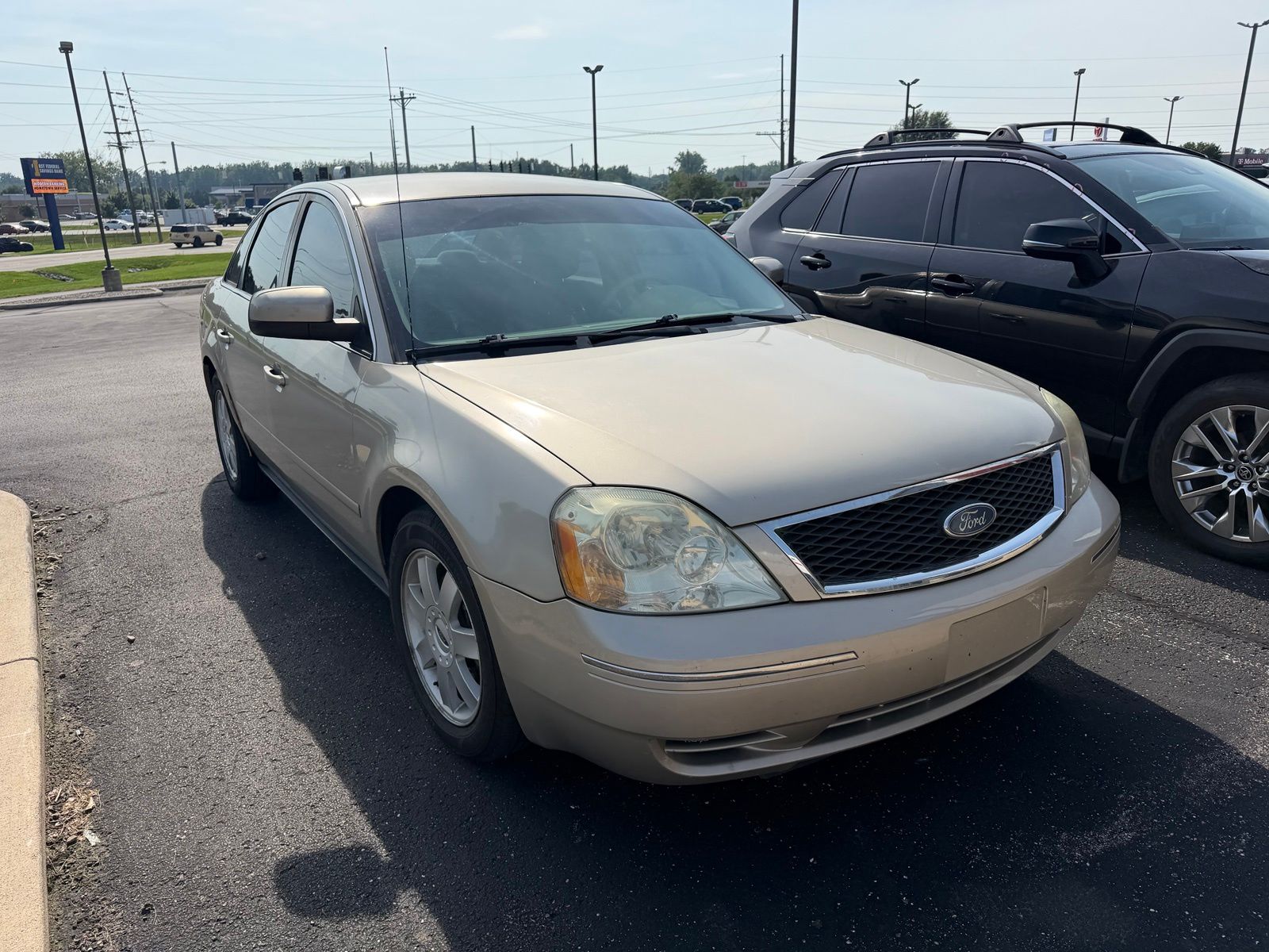 Gold 2005 Ford Five Hundred Sedan Front-Wheel Drive 6-Speed Automatic