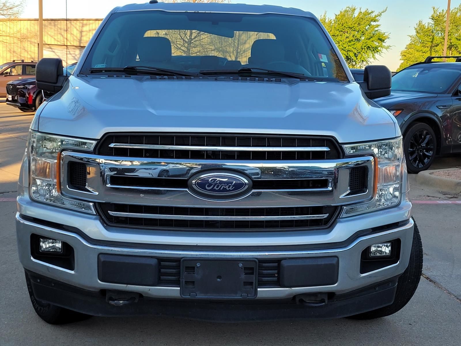 used 2018 Ford F-150 car, priced at $16,000