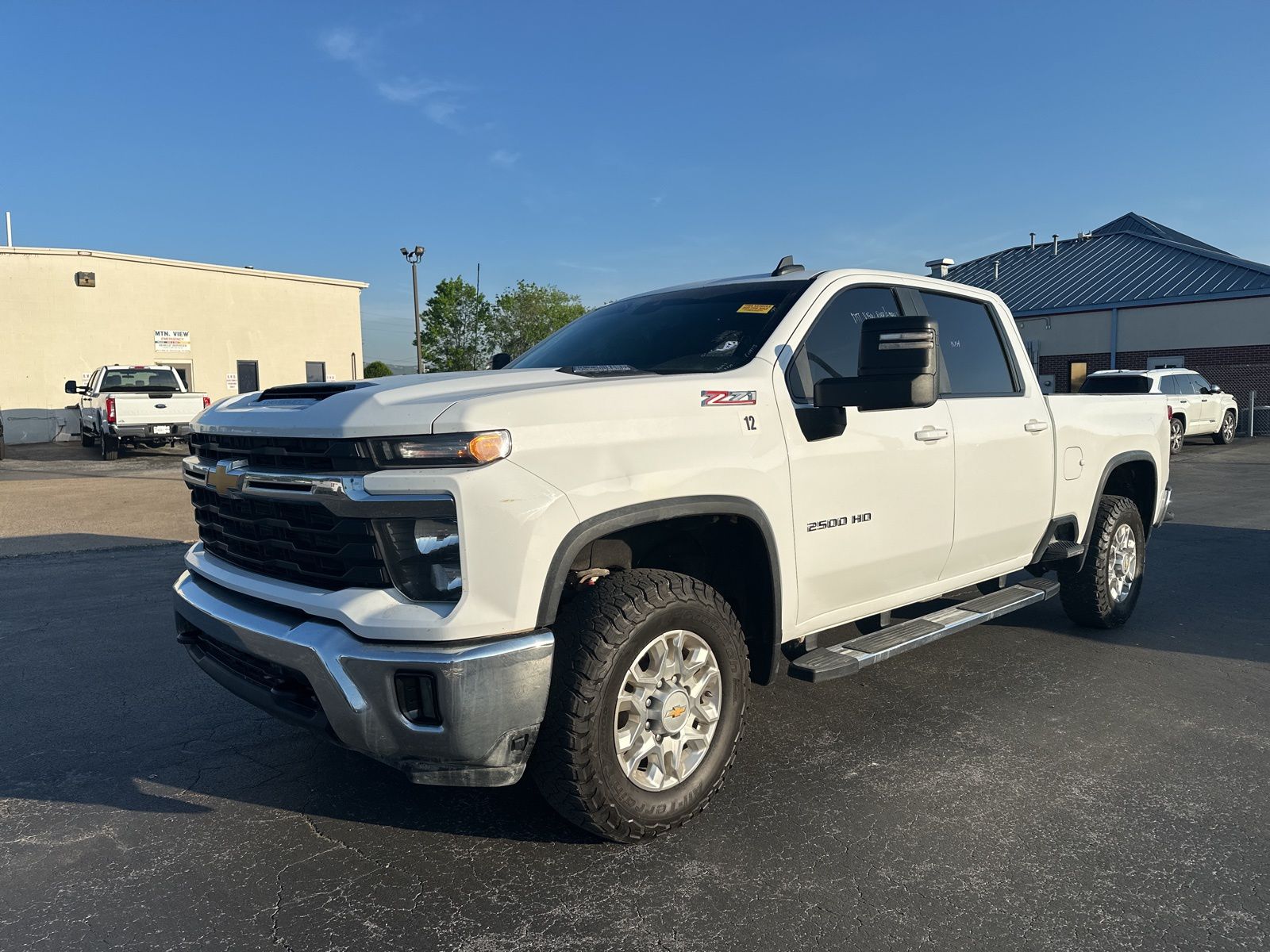 Summit White 2024 Chevrolet Silverado 2500HD LT Crew Cab 4WD Pickup Truck Four-Wheel Drive Automatic
