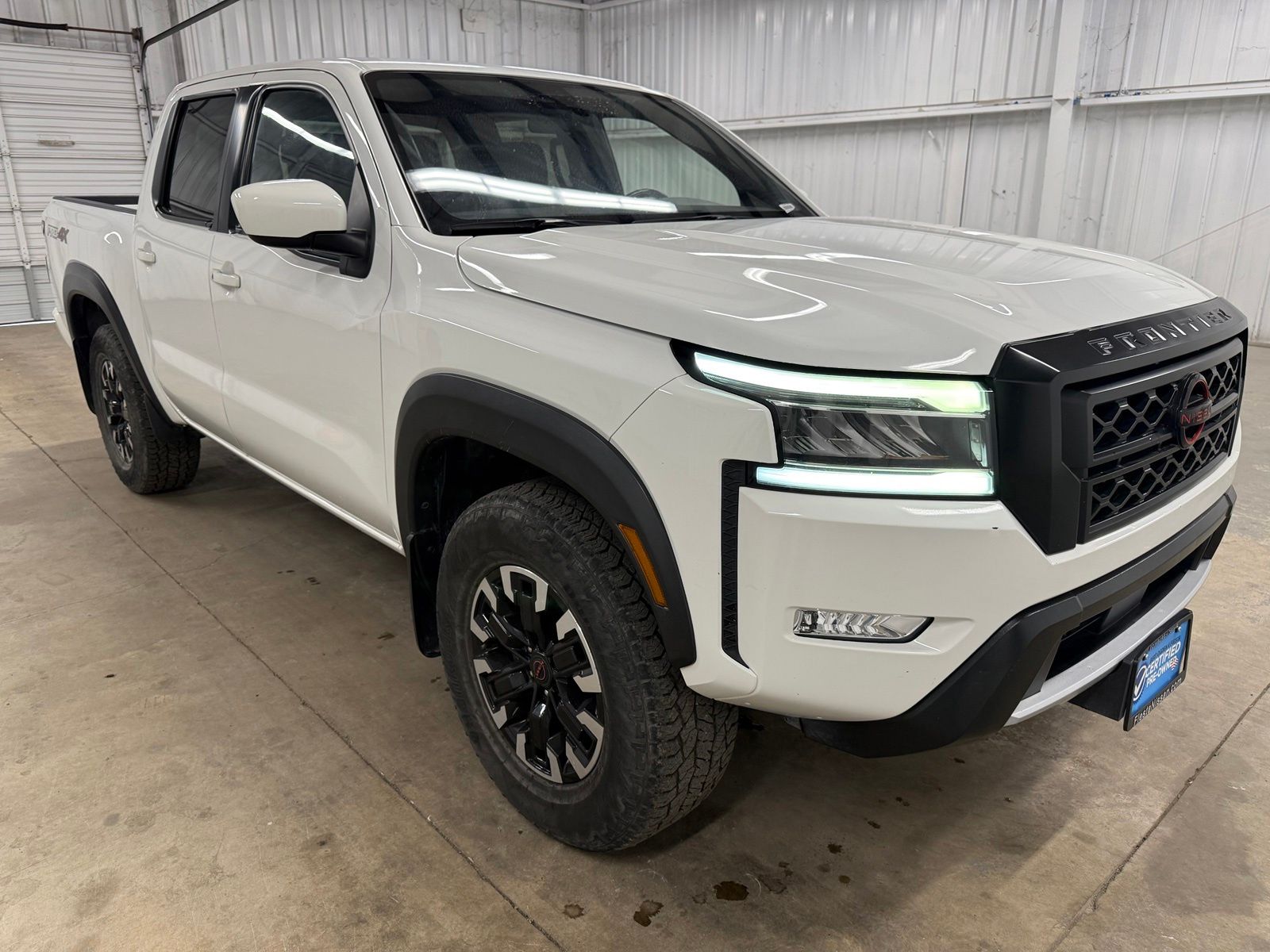 Glacier White 2023 Nissan Frontier Pickup Truck Four-Wheel Drive 9-Speed Automatic