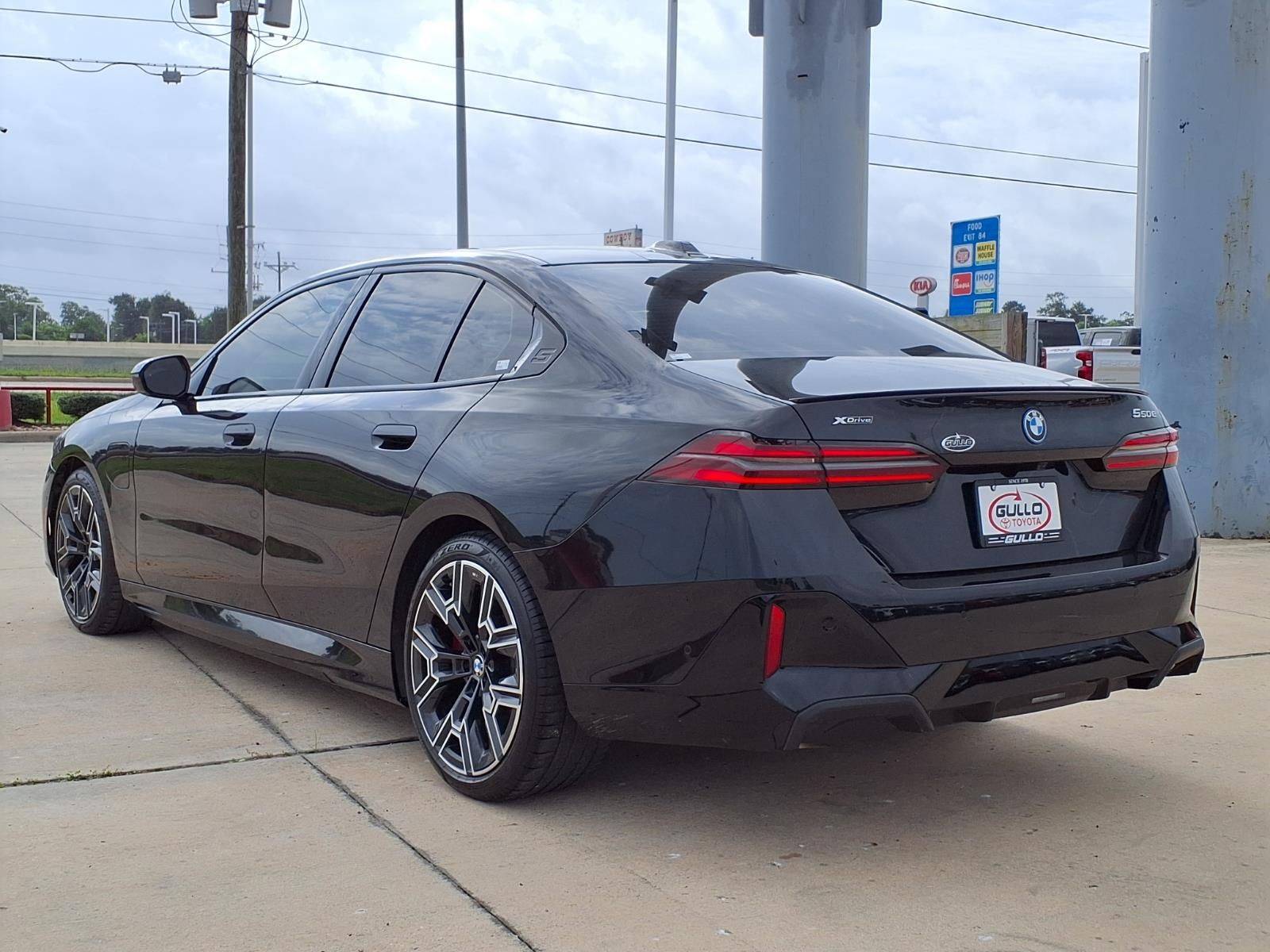 2026 BMW 5 Series 550e xDrive Black at Central Houston Nissan