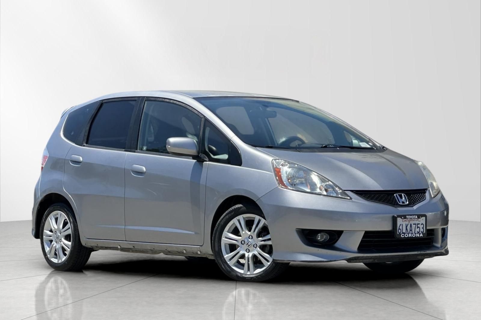 Storm Silver Metallic 2010 Honda Fit Hatchback Front-Wheel Drive 5-Speed Automatic