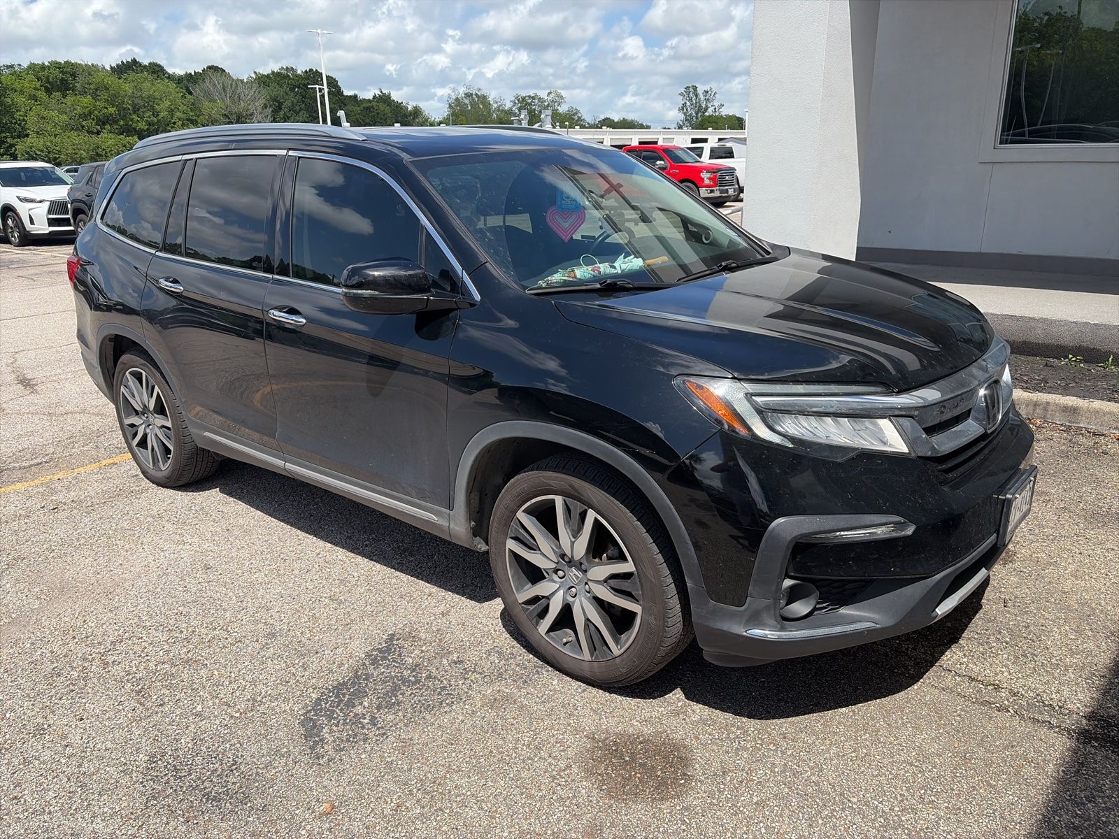 Black 2022 Honda Pilot Touring FWD with Rear Captain's Chairs SUV / Crossover Front-Wheel Drive 9-Speed Automatic