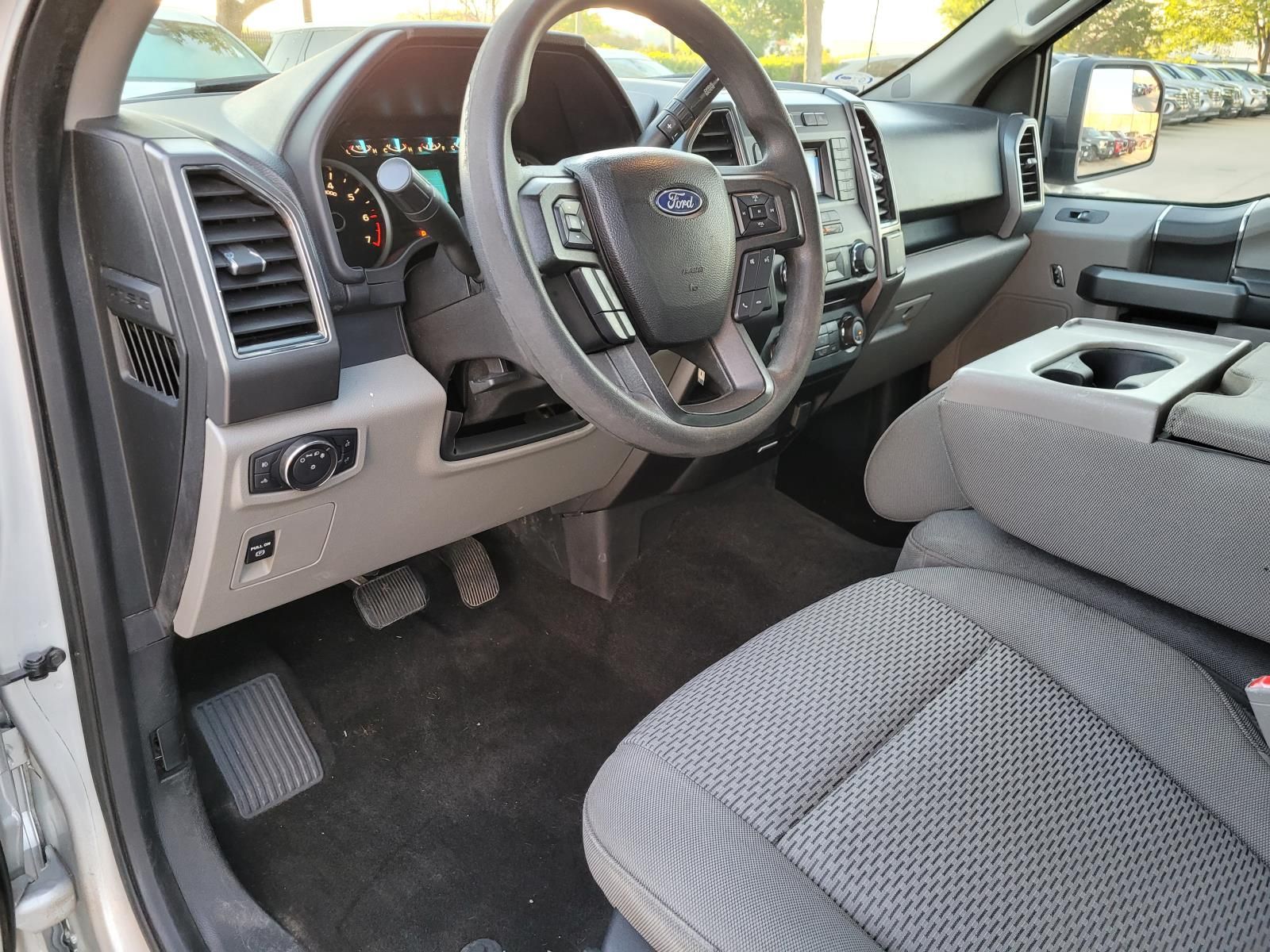 used 2018 Ford F-150 car, priced at $16,000