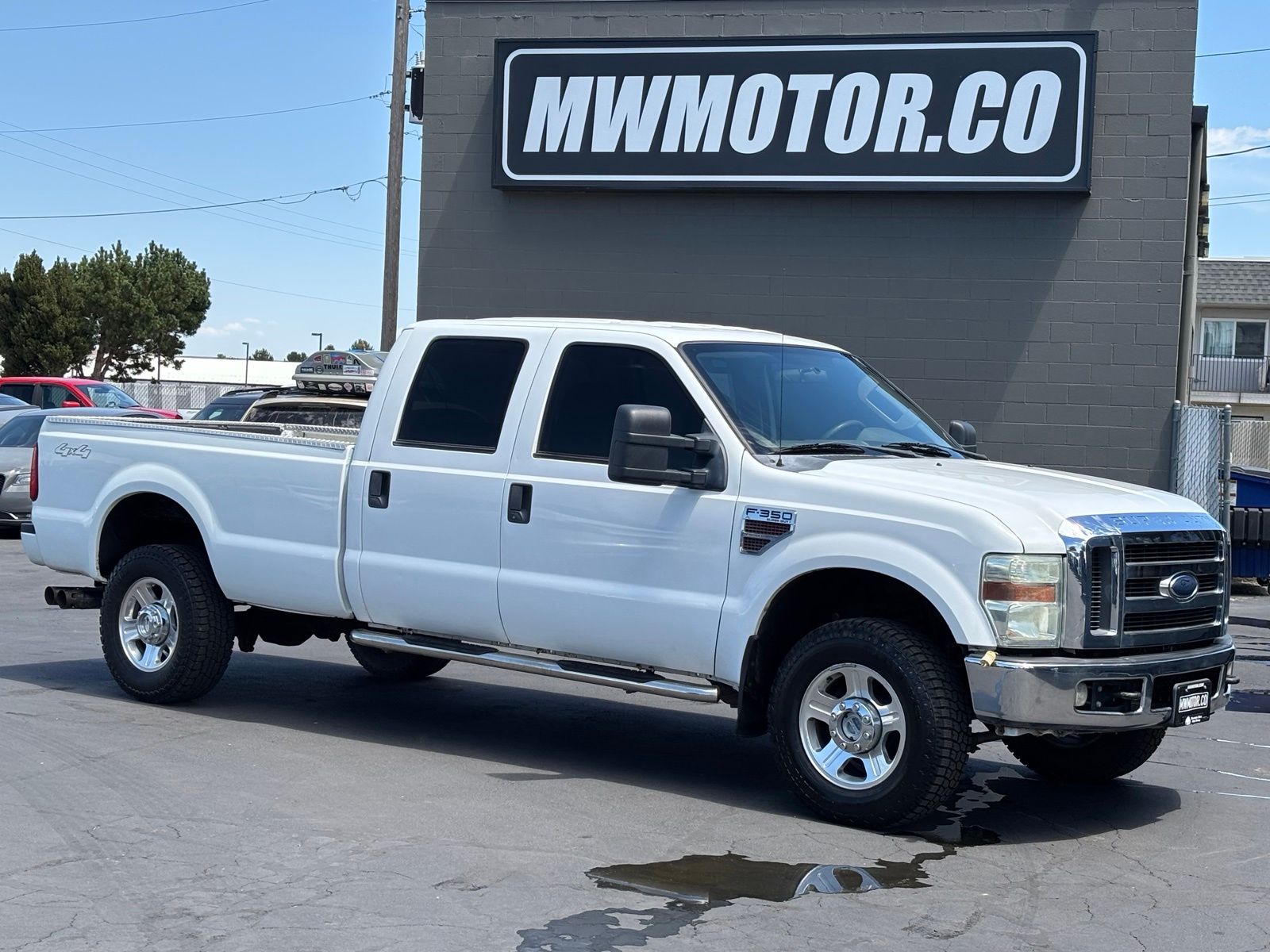 White 2009 Ford F-350 Super Duty Pickup Truck Four-Wheel Drive 6-Speed Manual Overdrive