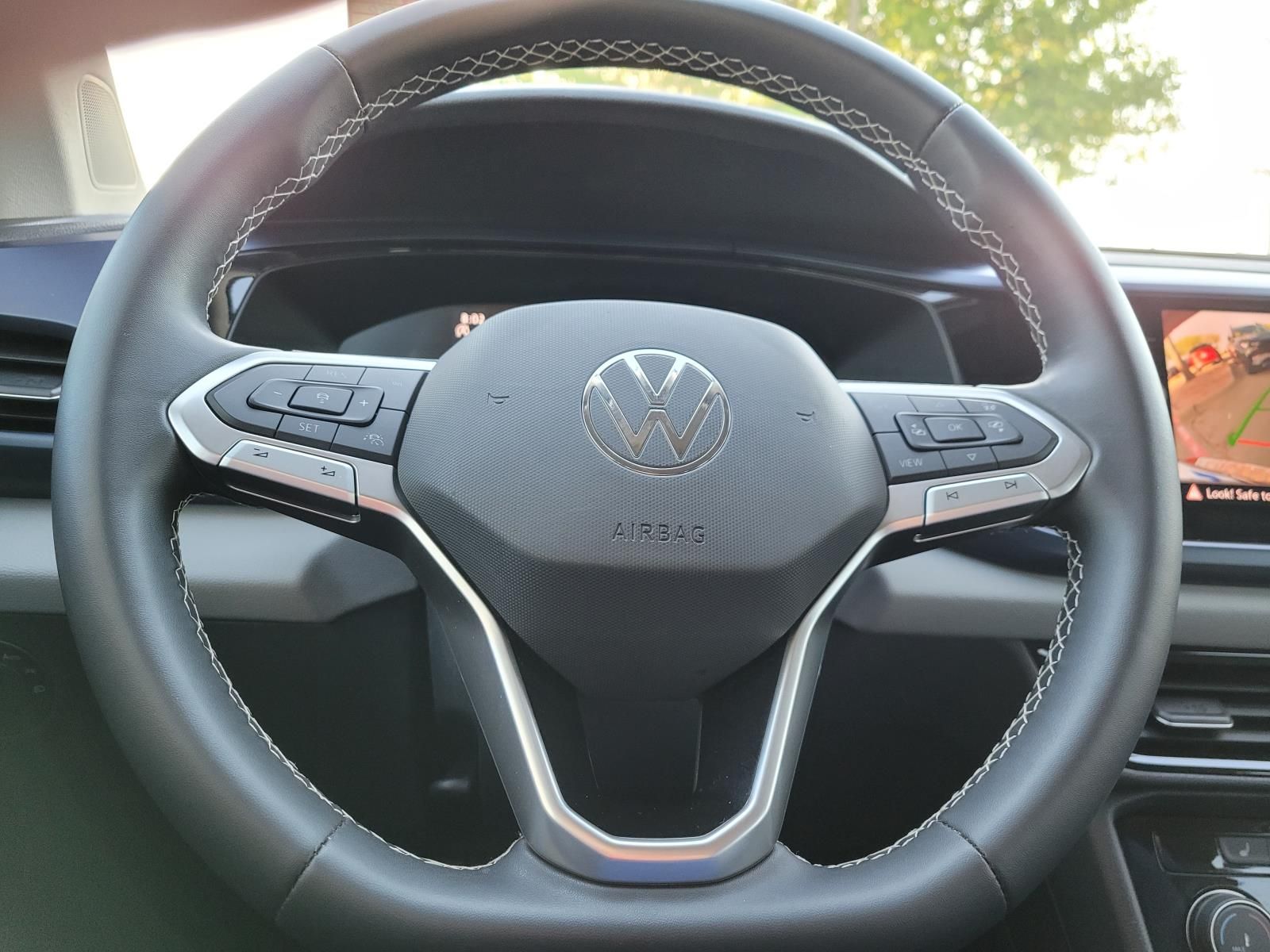 used 2023 Volkswagen Taos car, priced at $21,900