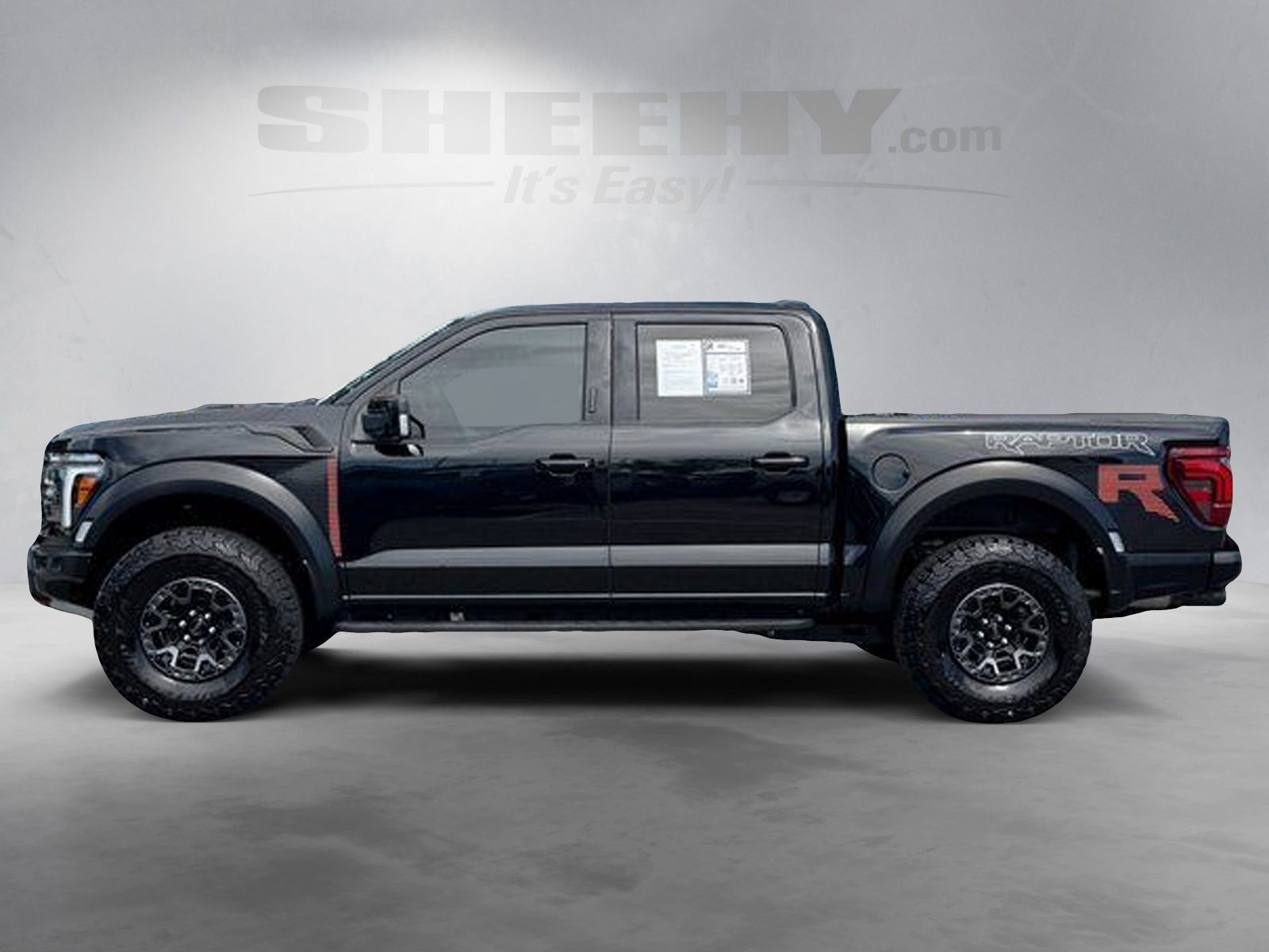 Certified Used 2024 Agate Black Metallic Ford Raptor image 16