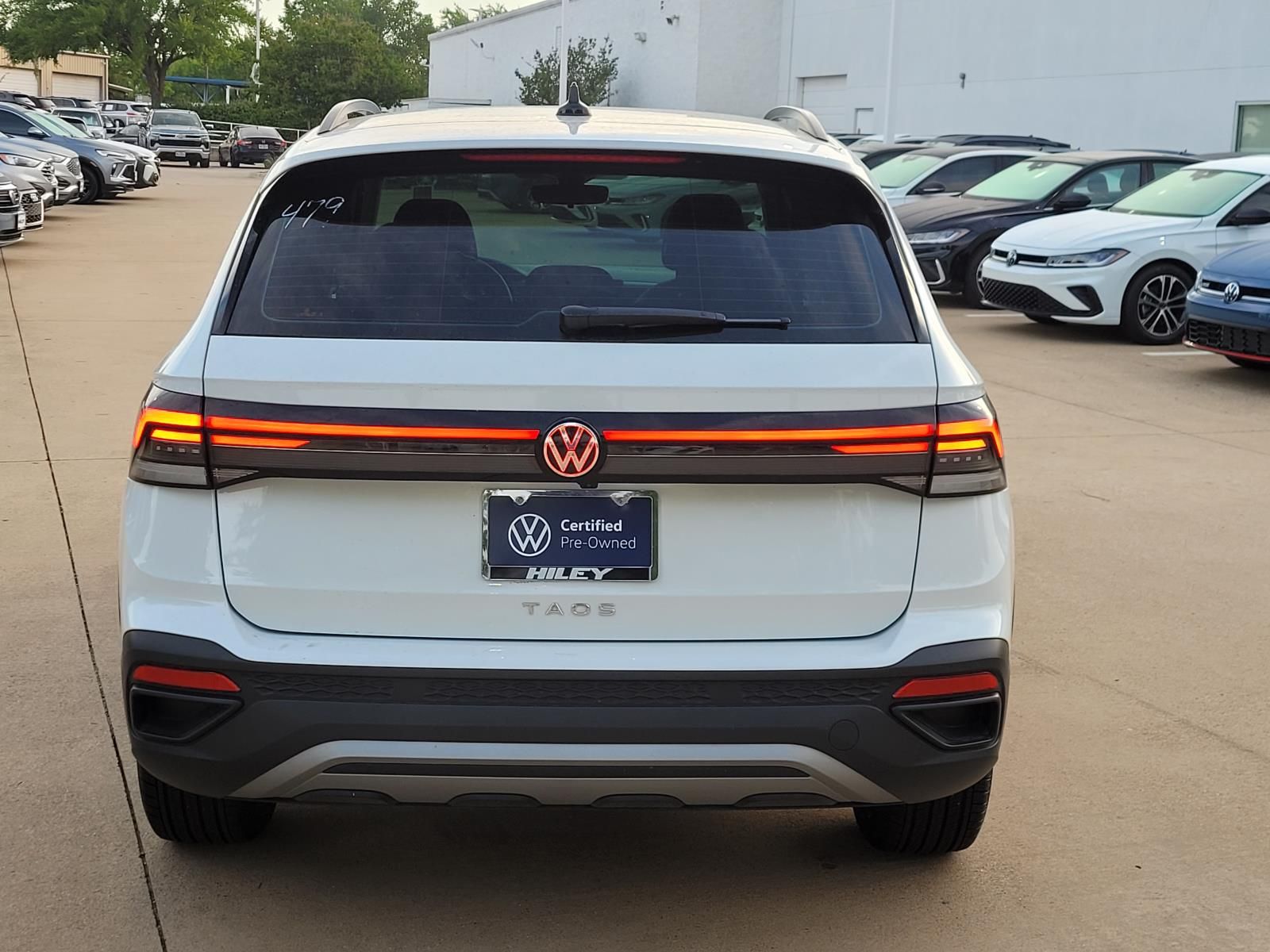 used 2025 Volkswagen Taos car, priced at $23,000
