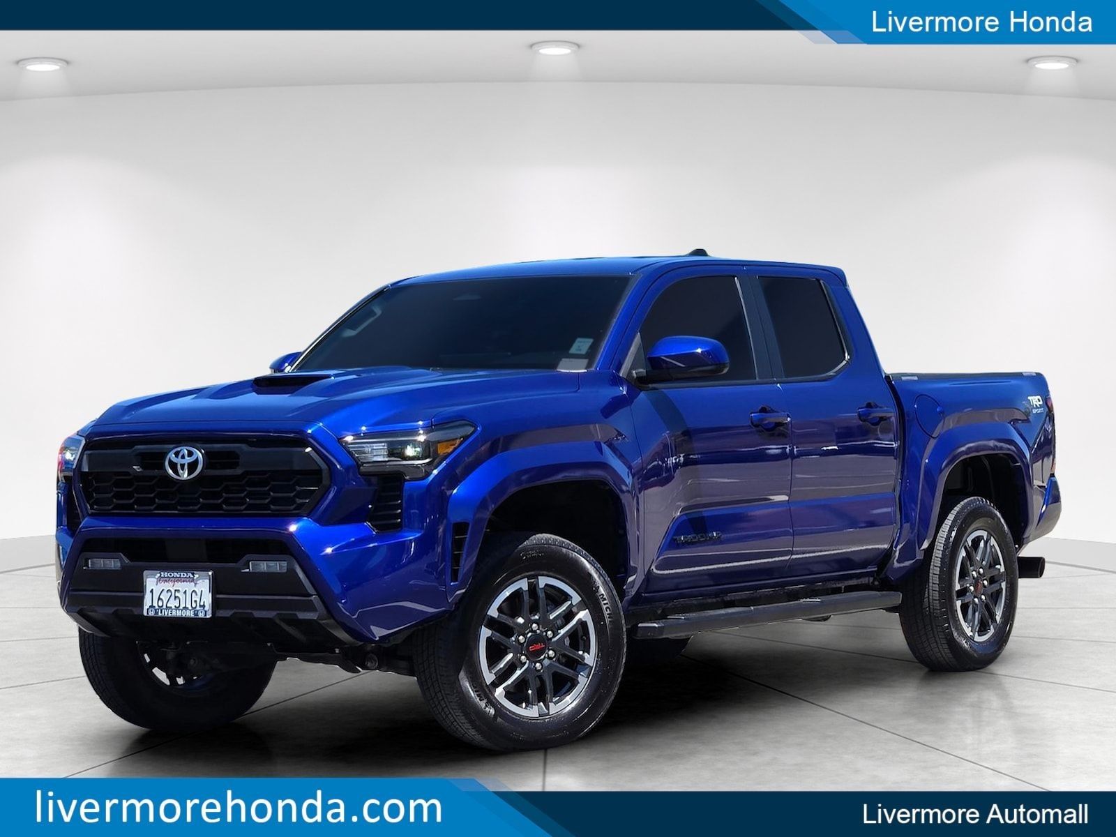 Blue 2025 Toyota Tacoma Pickup Truck Four-Wheel Drive 8-Speed Automatic
