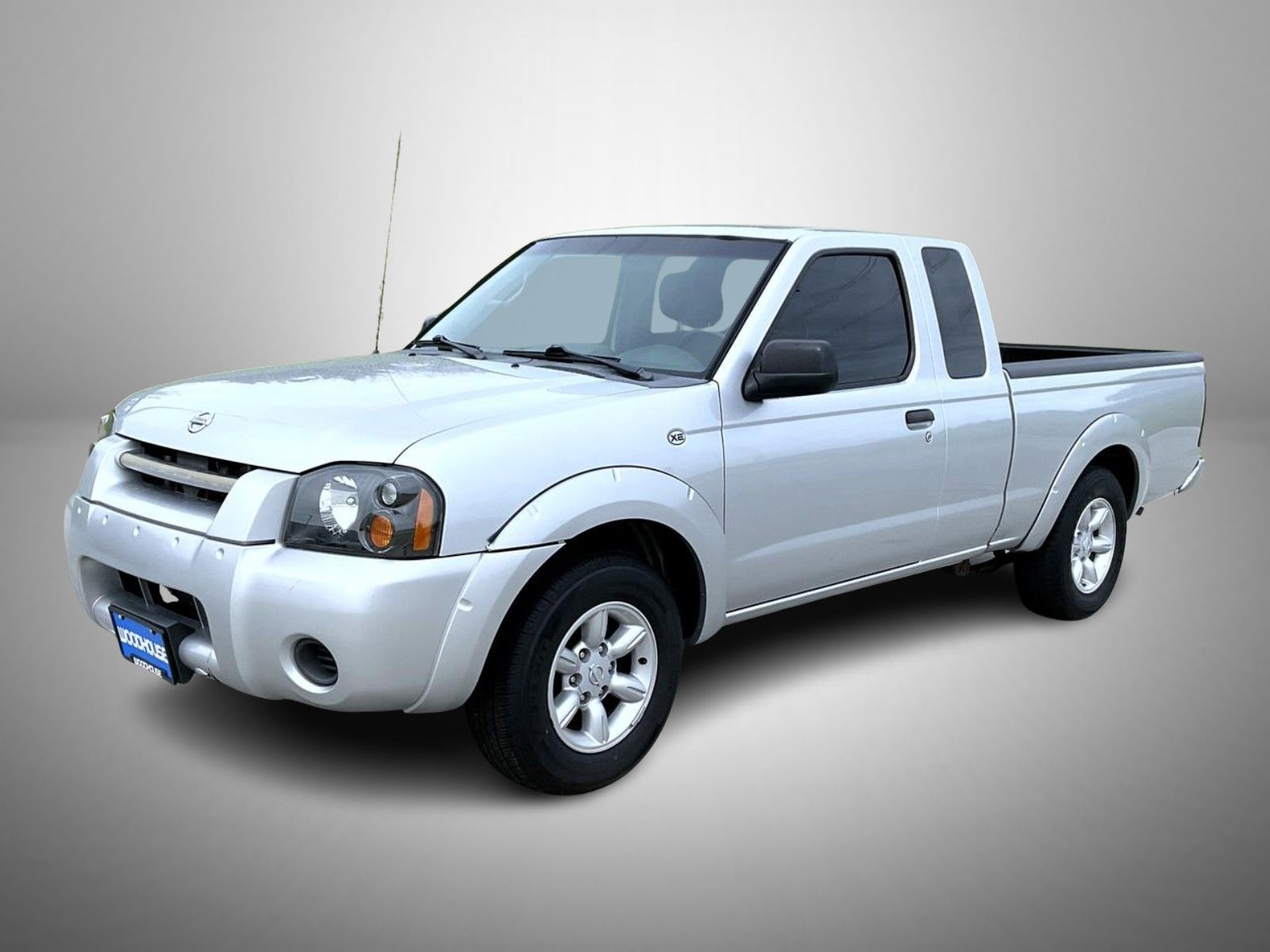 Radiant Silver Metallic 2004 Nissan Frontier 2 Dr XE Extended Cab SB Pickup Truck Rear-Wheel Drive 5-Speed Manual Overdrive