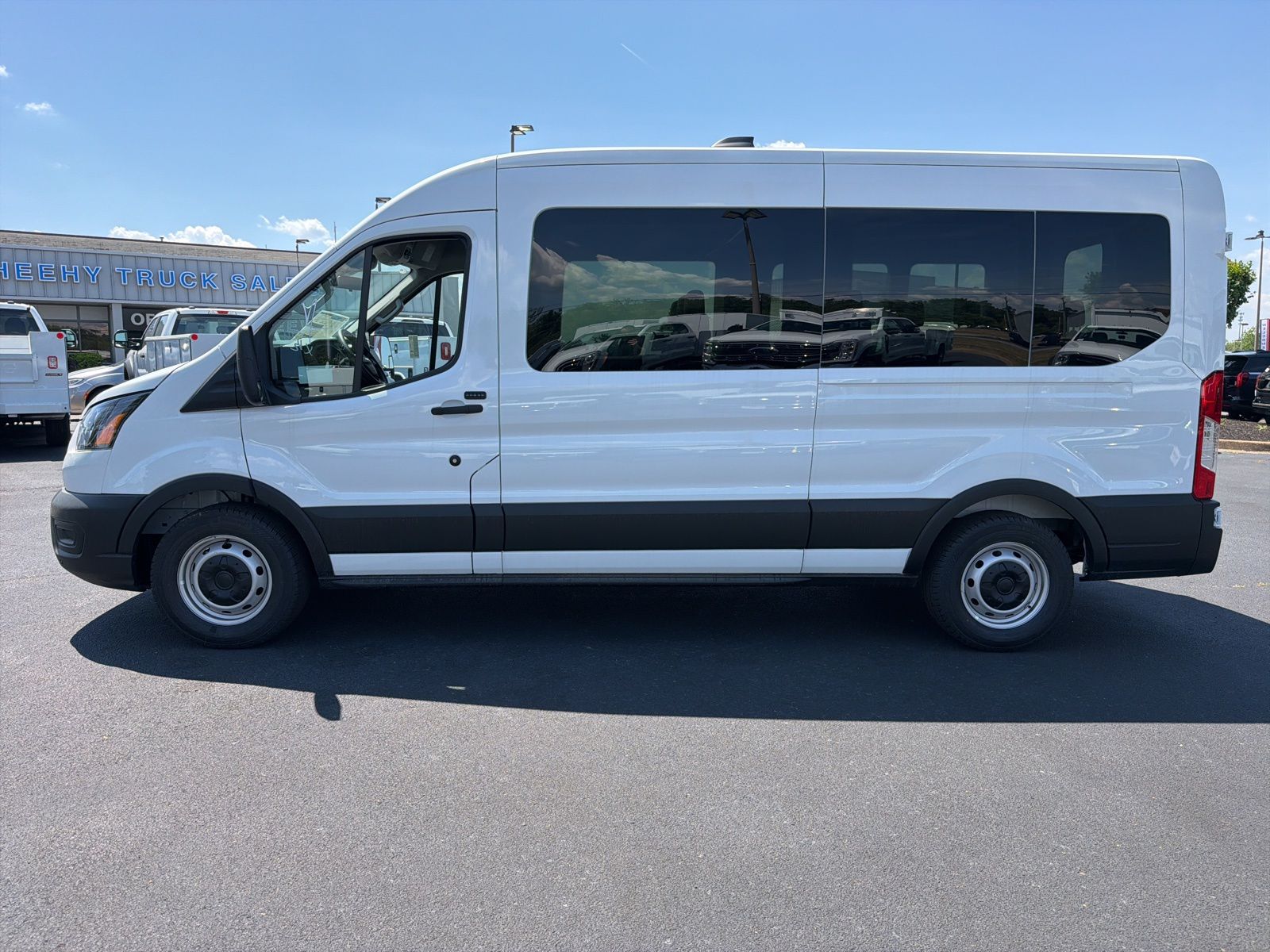 New 2026 White Ford Mid Roof 15-Passenger Van image 9