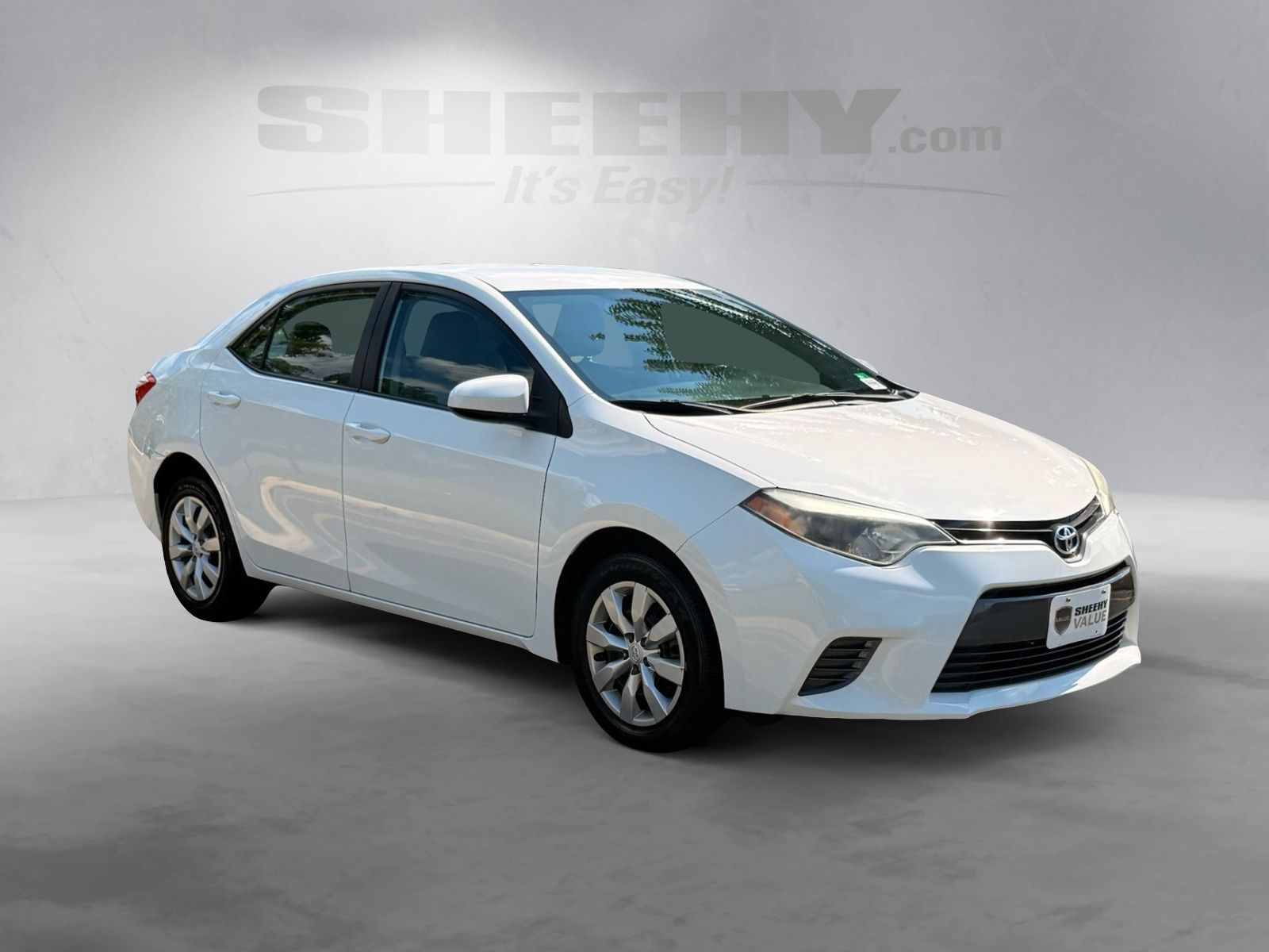 Used 2016 White Toyota LE image 2